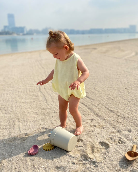 mace and co kids dubai linen material romper for boys and girls, lemon color, perfect for casual wear, trips to the beach, playtime and parties. 